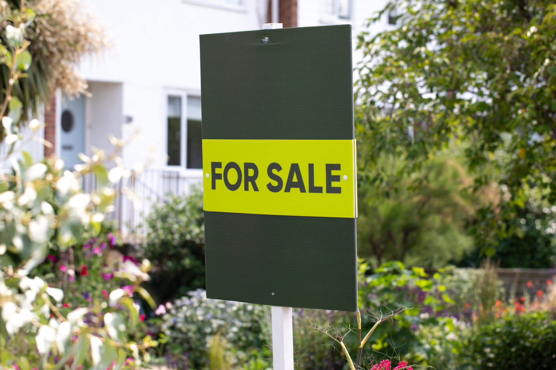 For sale sign outside a house